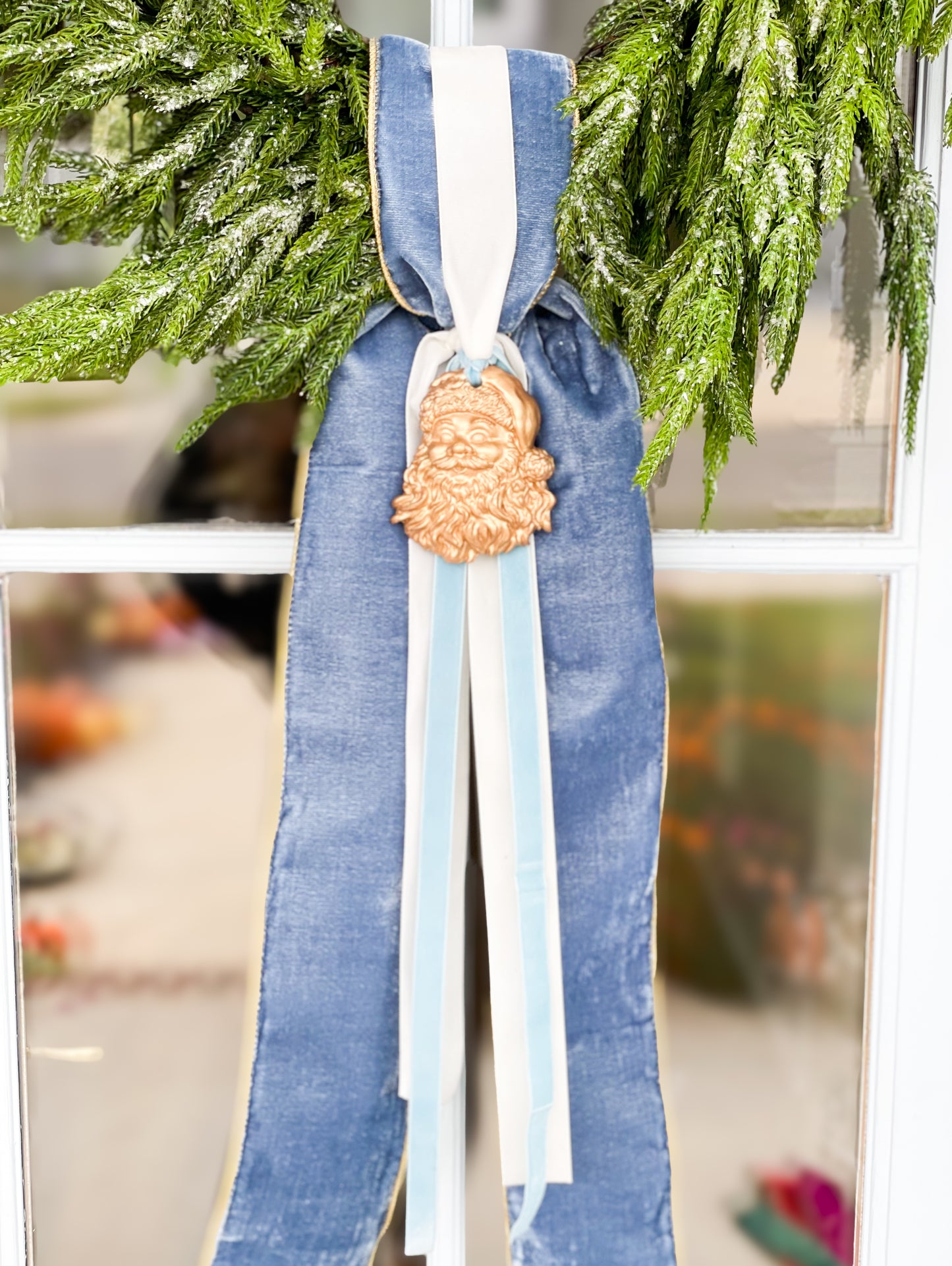 The Blue Believe Iced Fir Pine Wreath With Sash And Santa