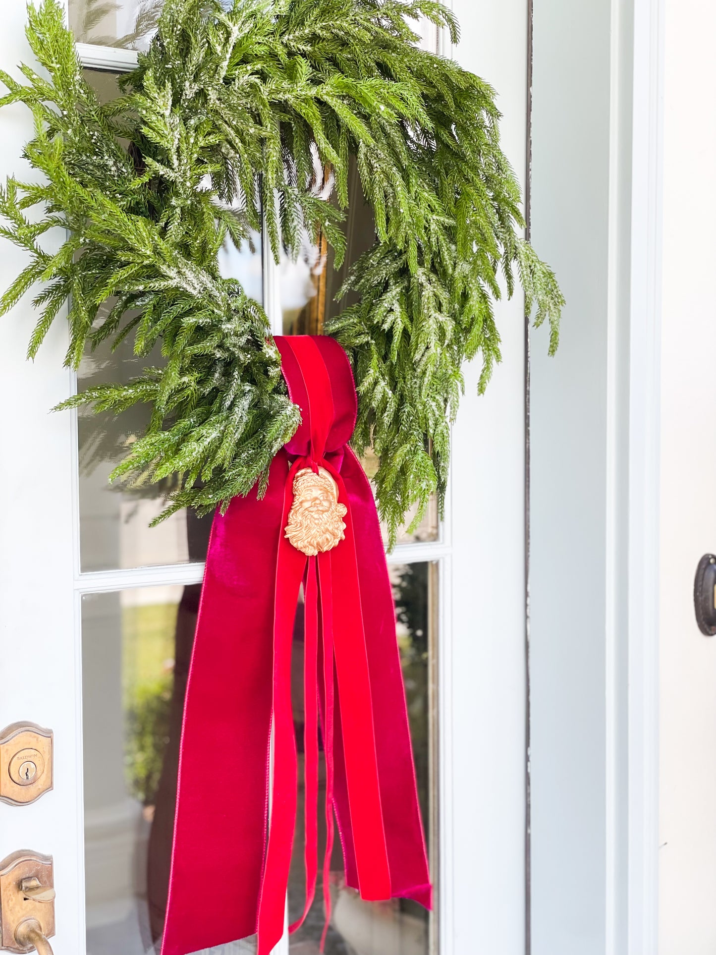 The Hot Pink Believe Iced Fir Pine Wreath With Sash And Santa
