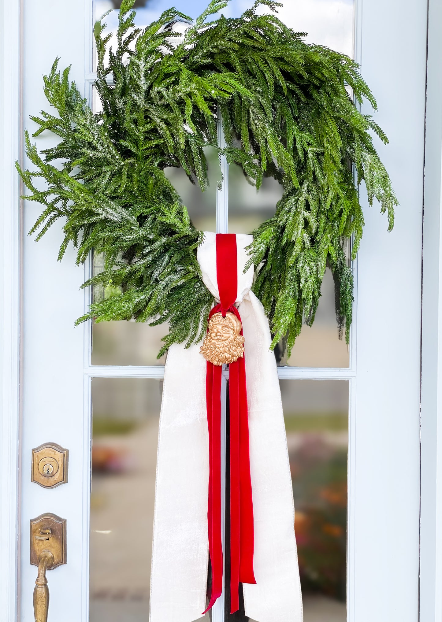 The White Believe Iced Fir Pine Wreath With Sash And Santa