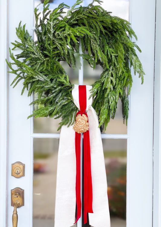 The White Believe Iced Fir Pine Wreath With Sash And Santa