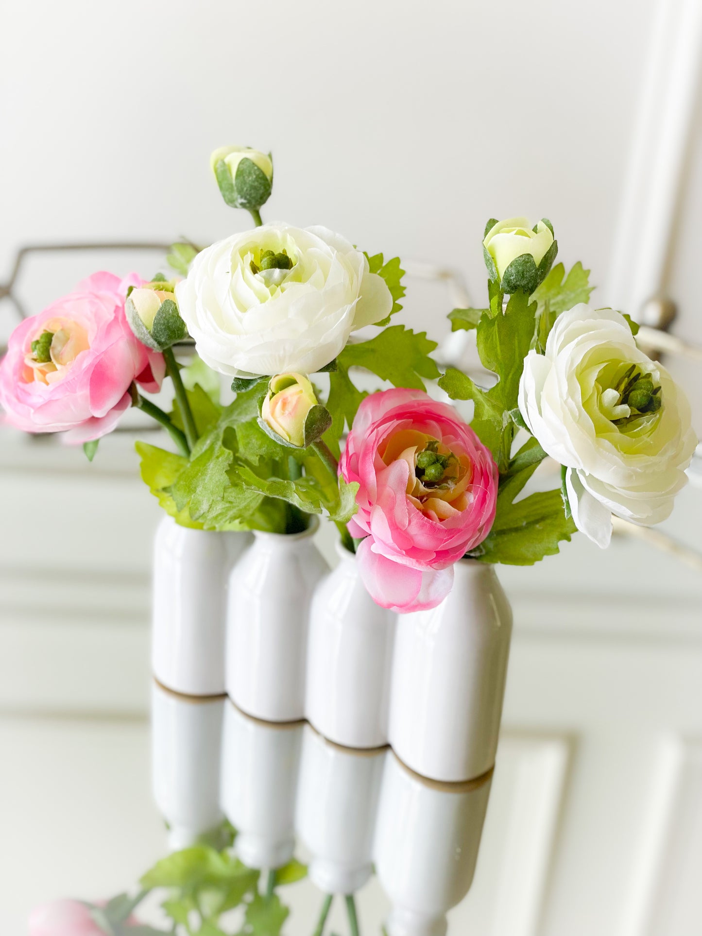 Pink And White Ranunculus In Ceramic Vase