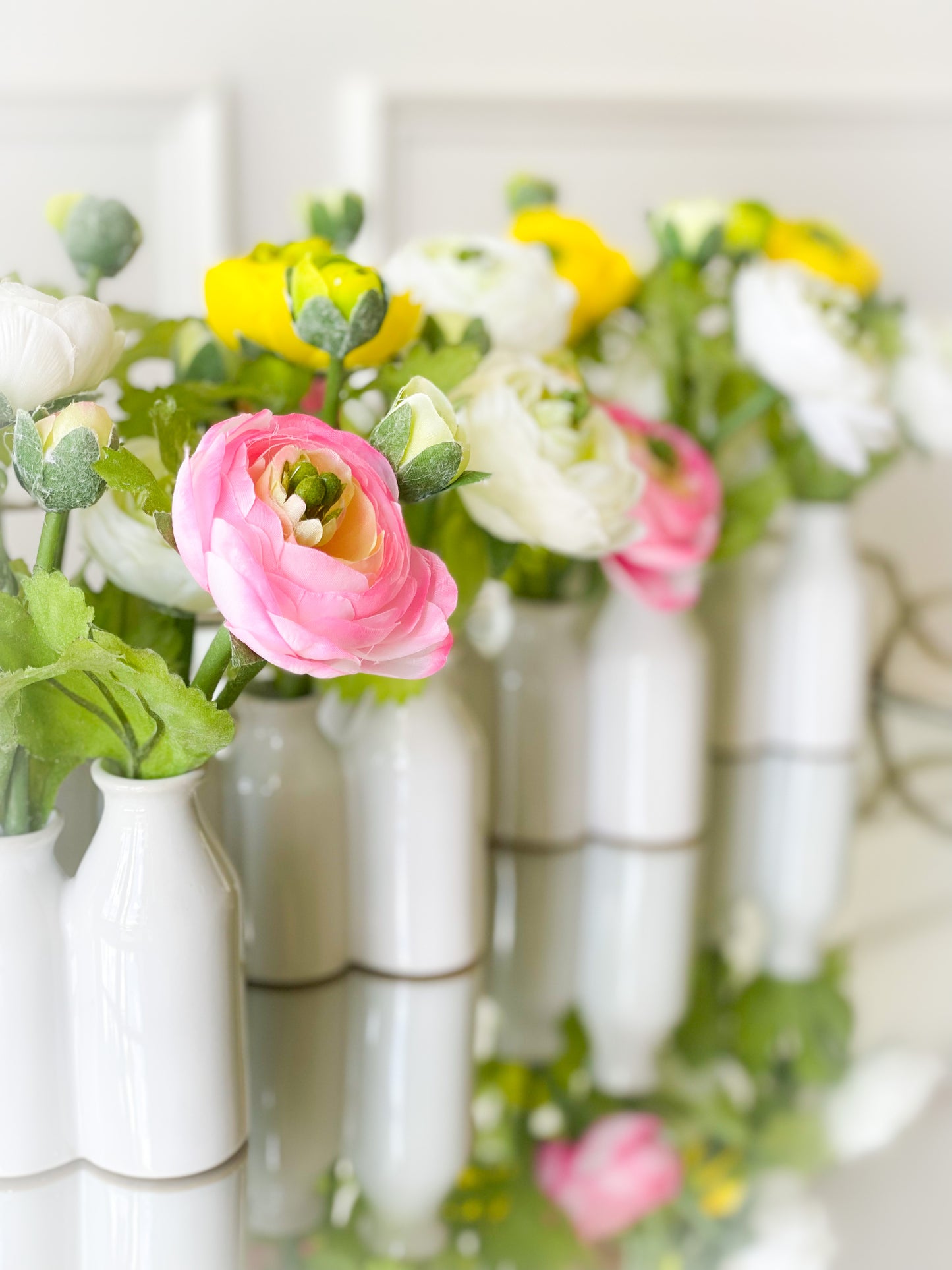 Pink And White Ranunculus In Ceramic Vase