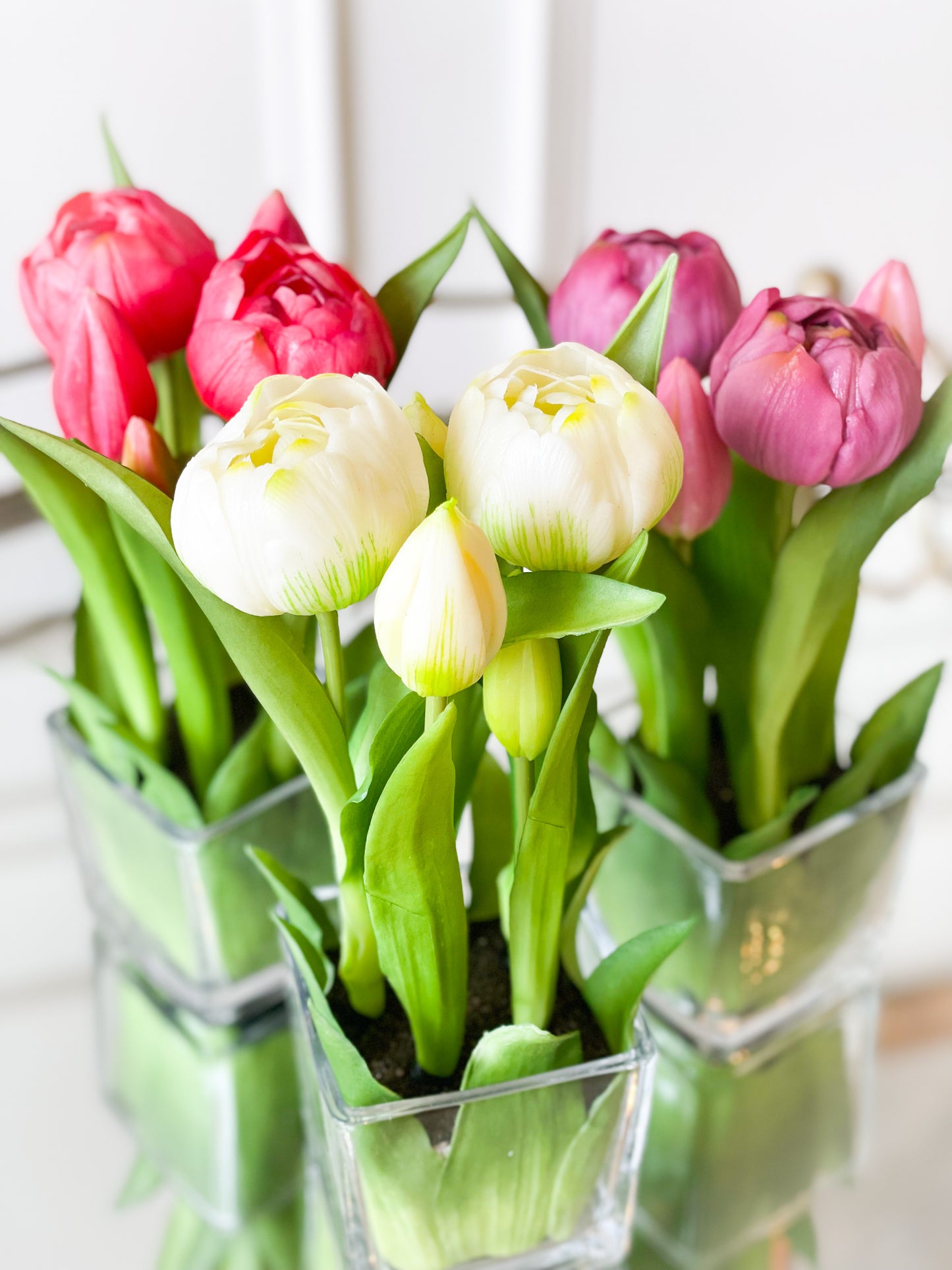 Purple Tulips In A Glass Vase