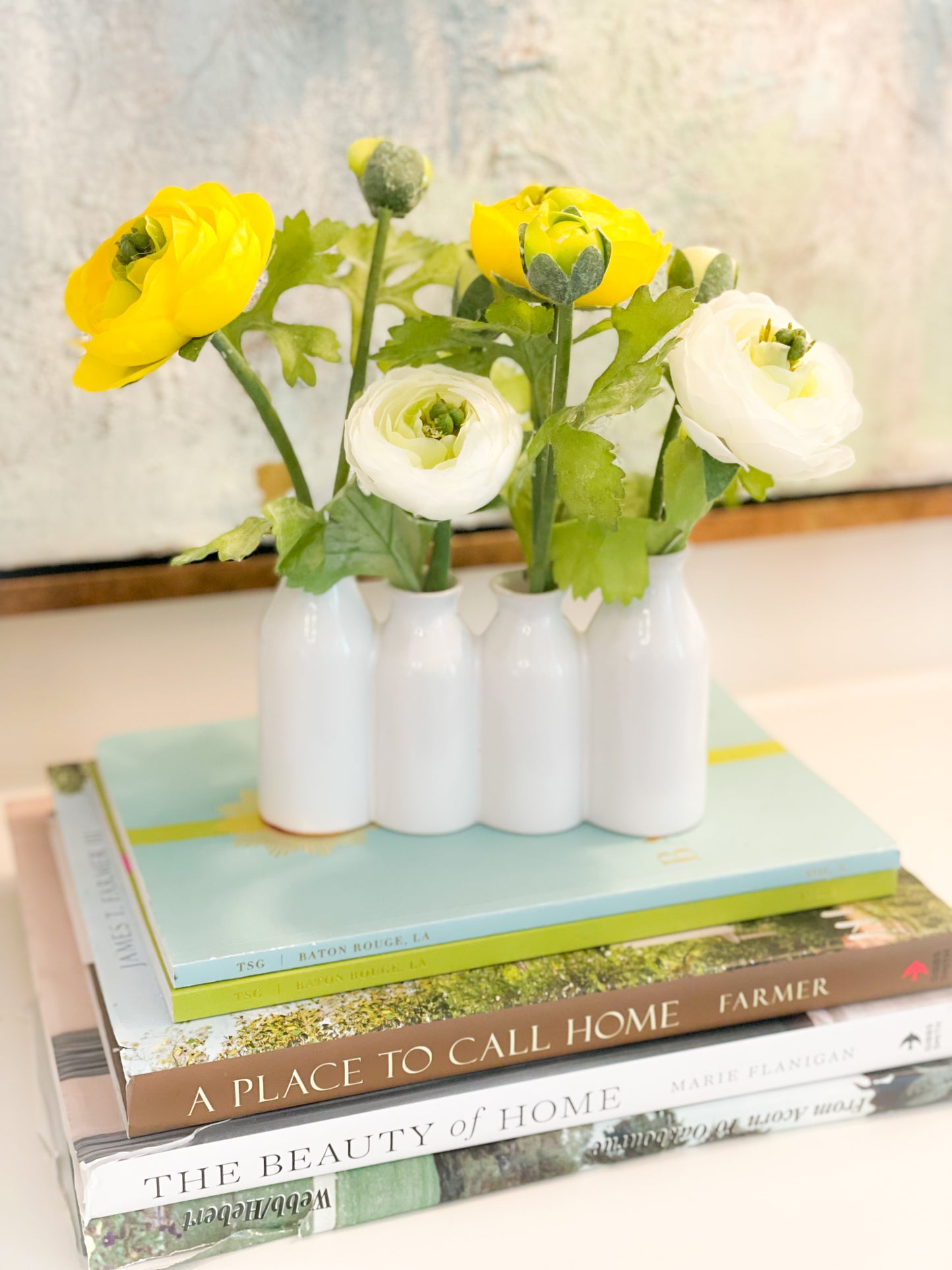 Yellow And White Ranunculus In Ceramic Vase
