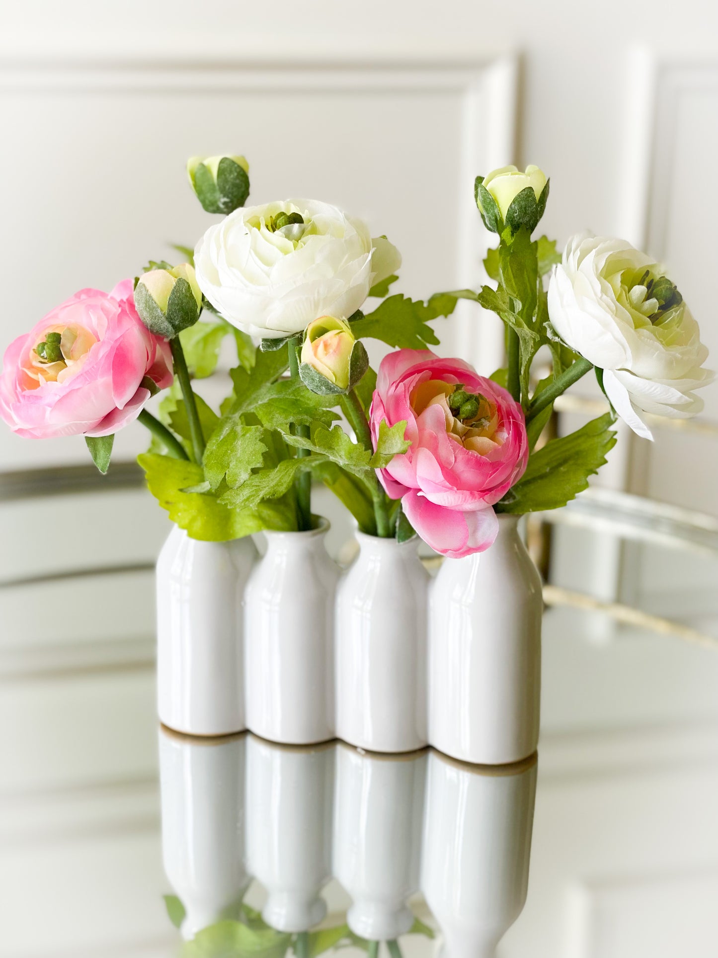 Pink And White Ranunculus In Ceramic Vase