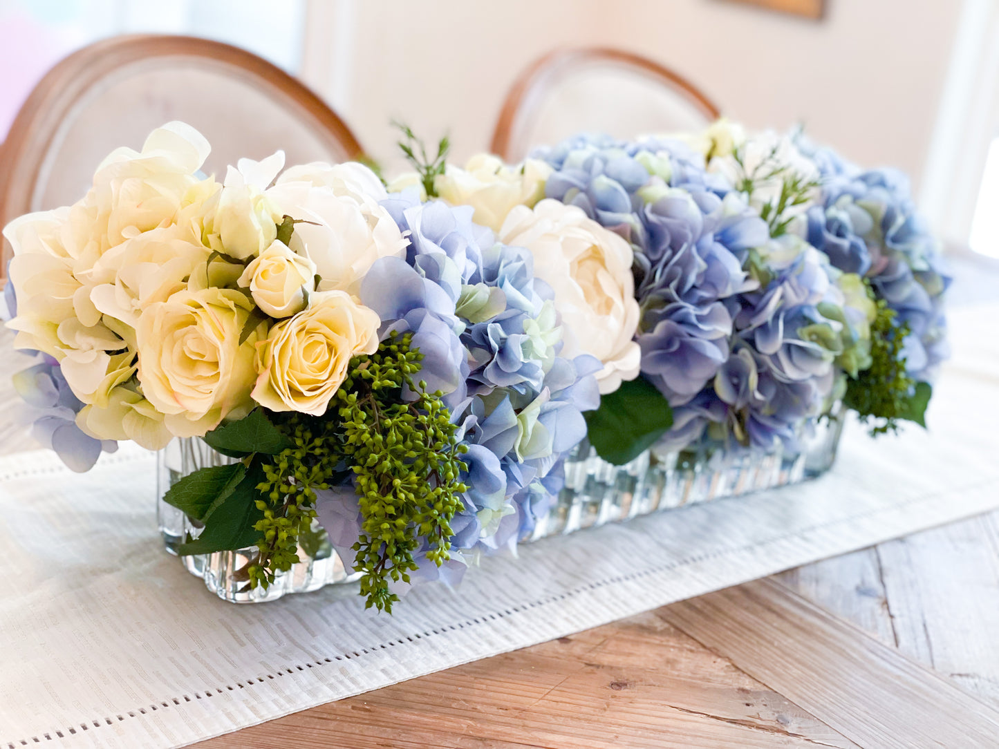 Blue And White Long Hydrangea, Rose, And Peony Arrangement In Ribbed Glass Vase