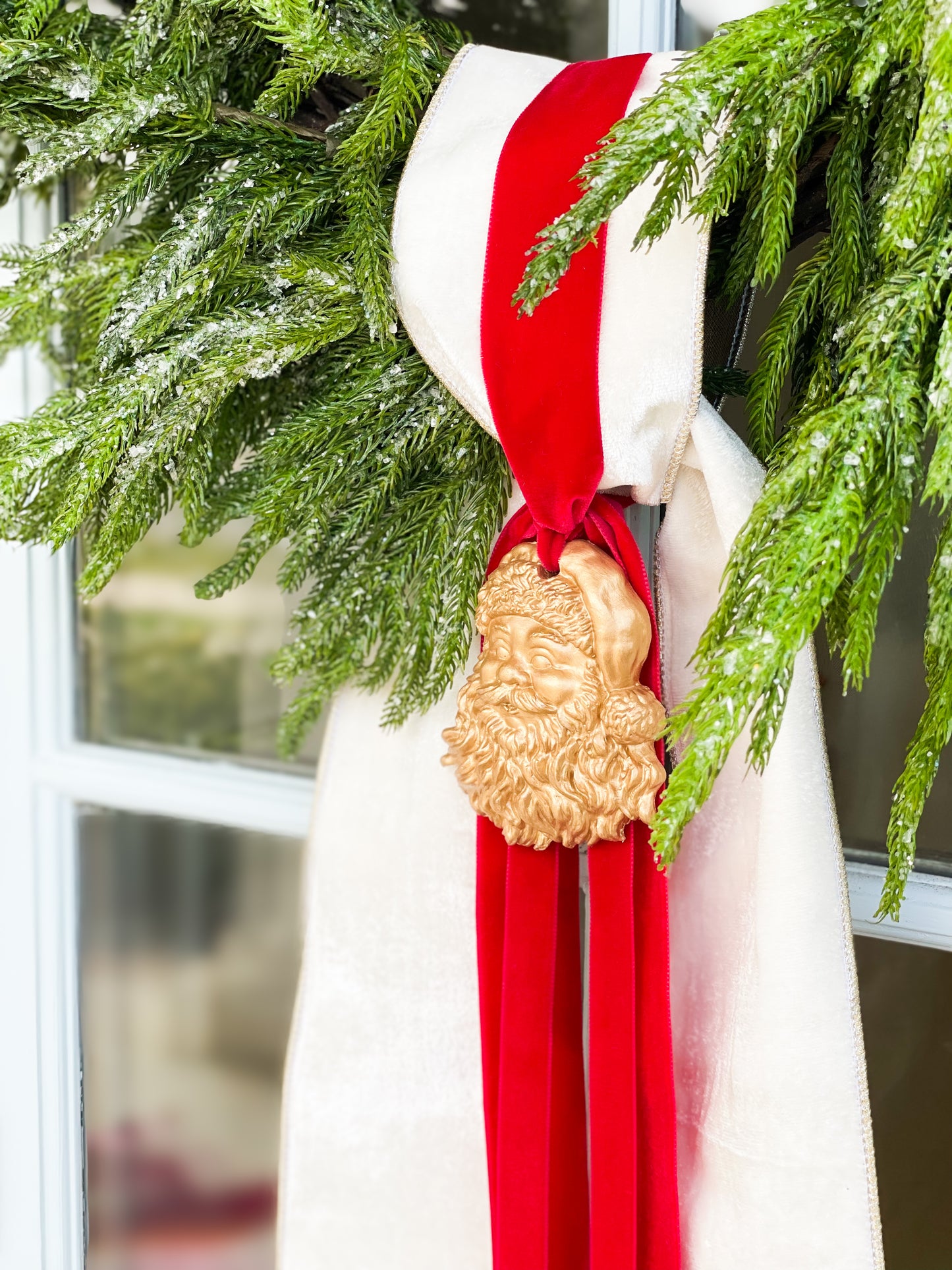 The White Believe Iced Fir Pine Wreath With Sash And Santa