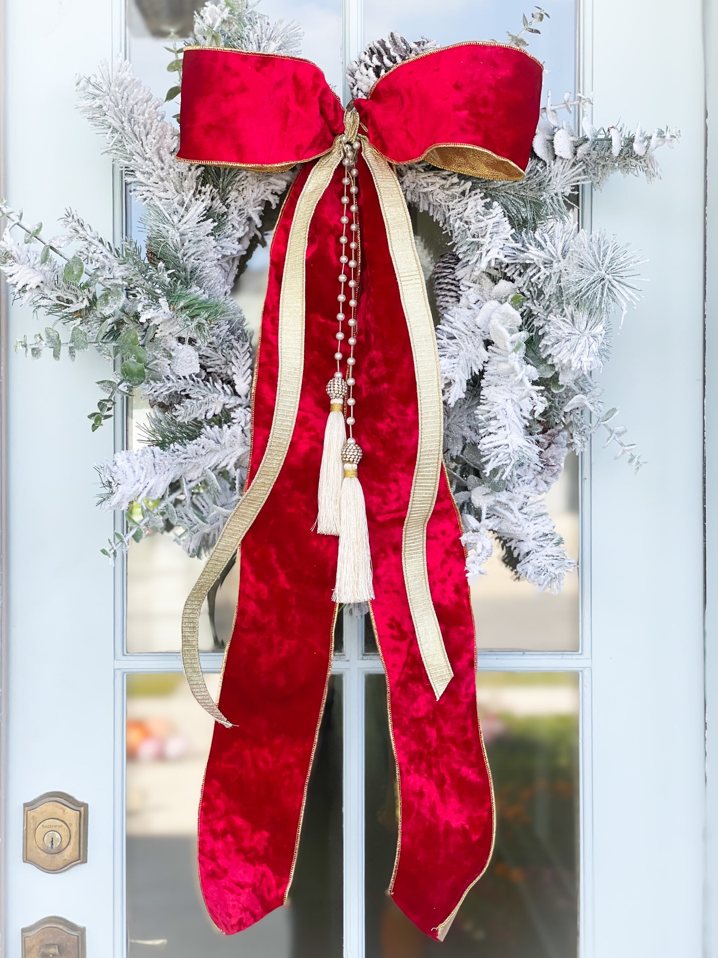The Red Noel Flocked Wreath And Bow With Pearl Tassel