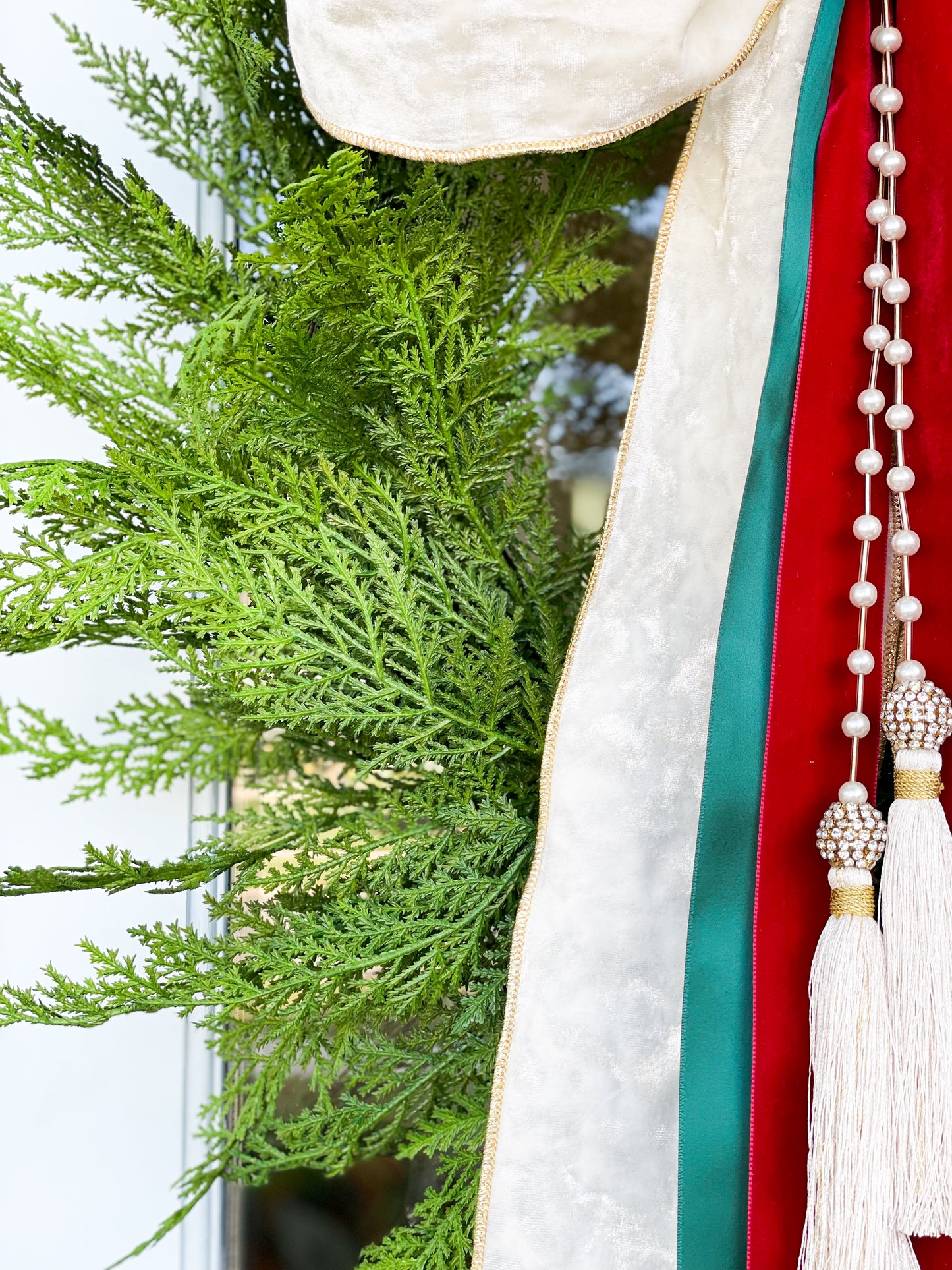 The White Noel Cypress Wreath And Bow With Pearl Tassel