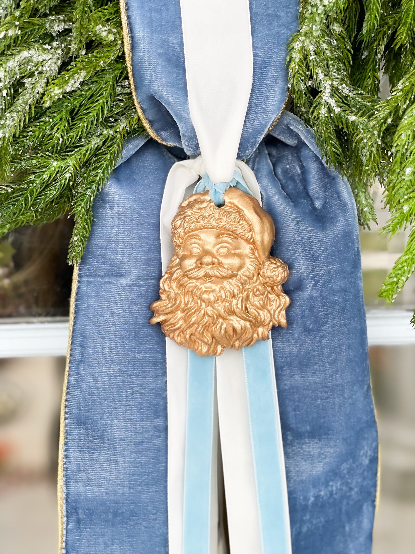 The Blue Believe Iced Fir Pine Wreath With Sash And Santa