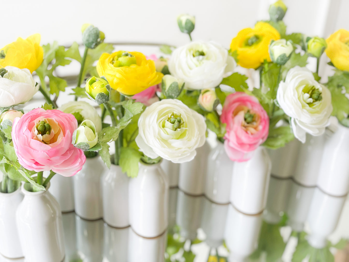 Yellow And White Ranunculus In Ceramic Vase