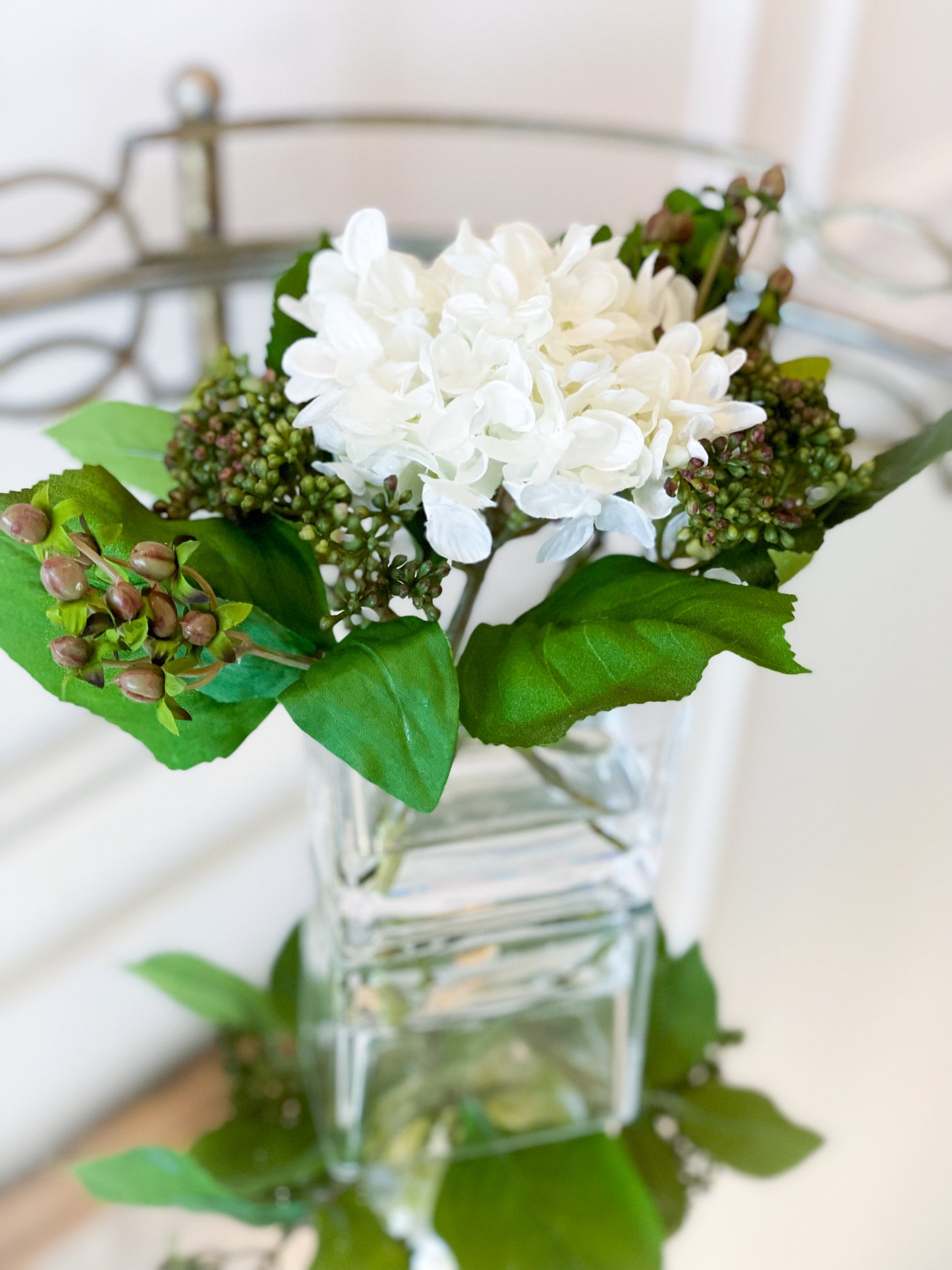White Hydrangea And Sedum In A Glass Vase With Acrylic Water
